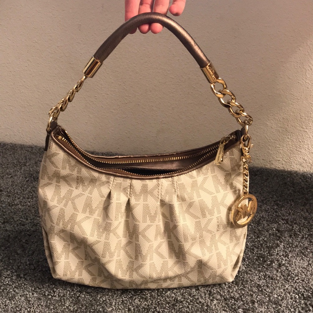 Authentic Michael Kors handbag.